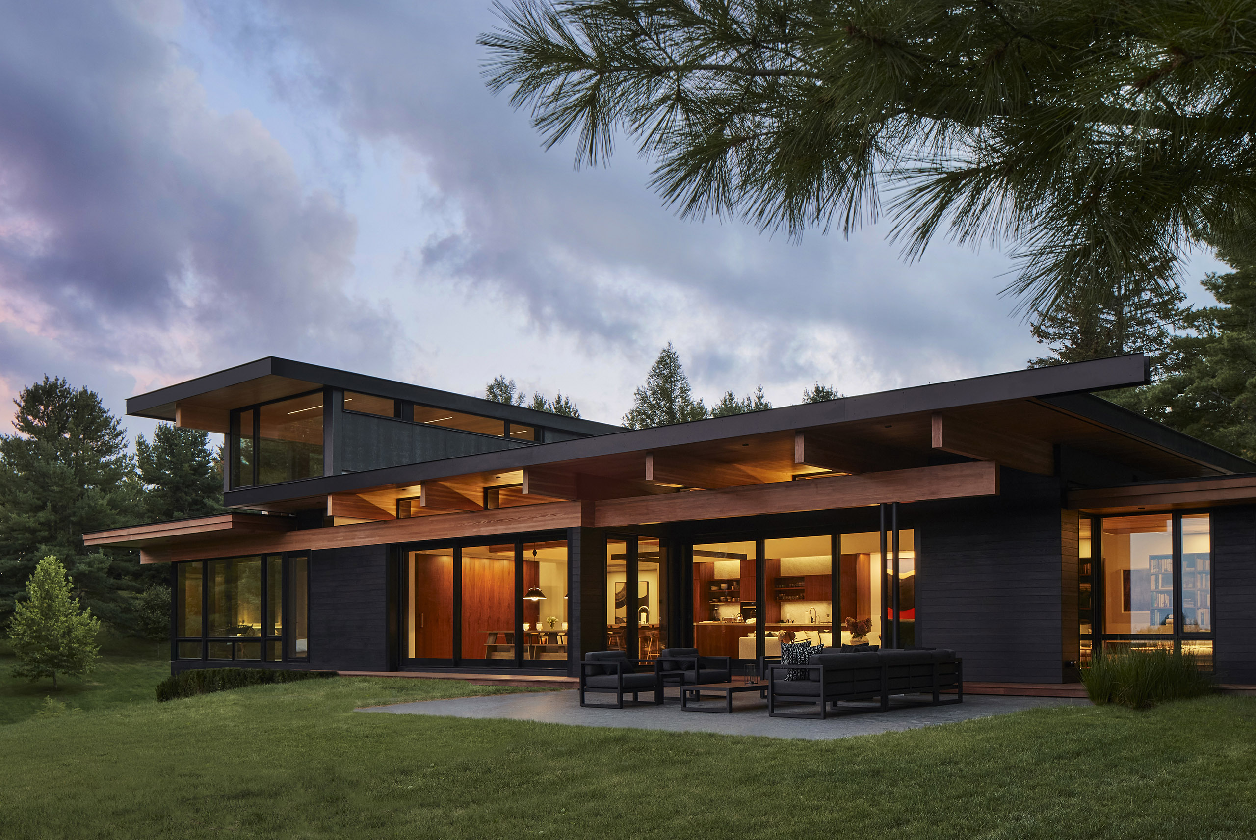 Exterior rear view of a rural modern home in Canada