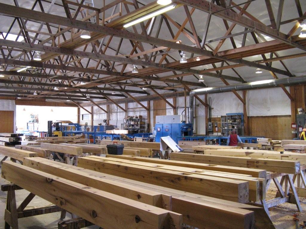 Wooden beams are built in a large factory
