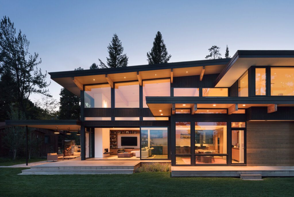 Exterior elevation of a two-story modern home at dawn