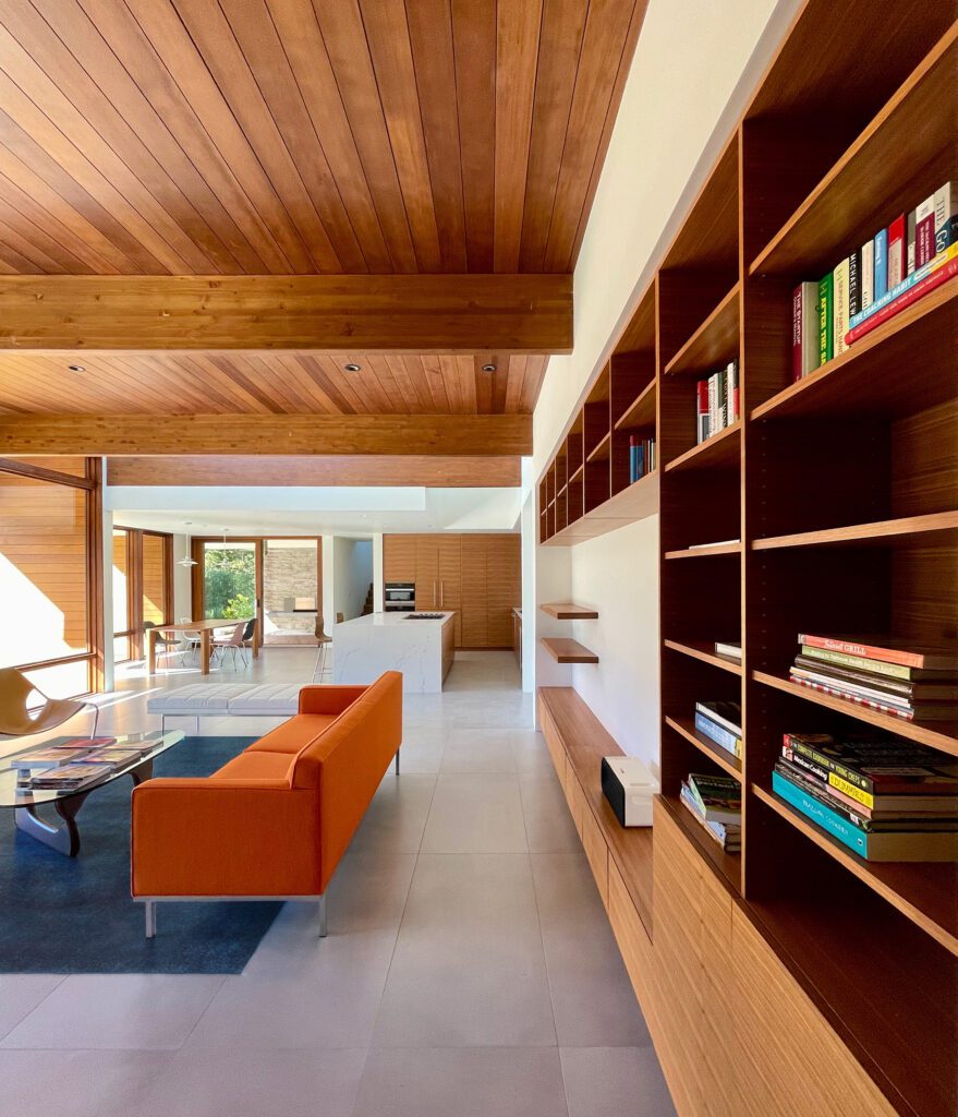 View of a great room with sitting area and bookshelves