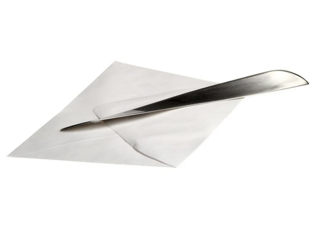 Steel letter opener and envelope