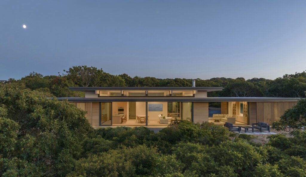 Single-level modern home at dusk