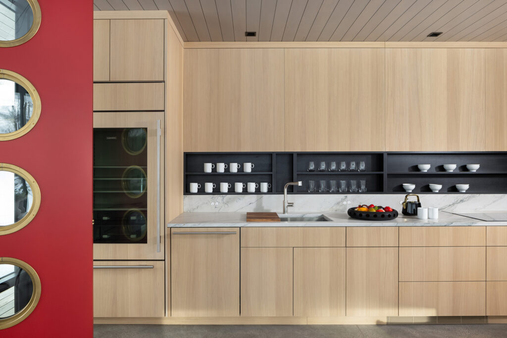Custom white oak cabinetry in the kitchen of an ADU
