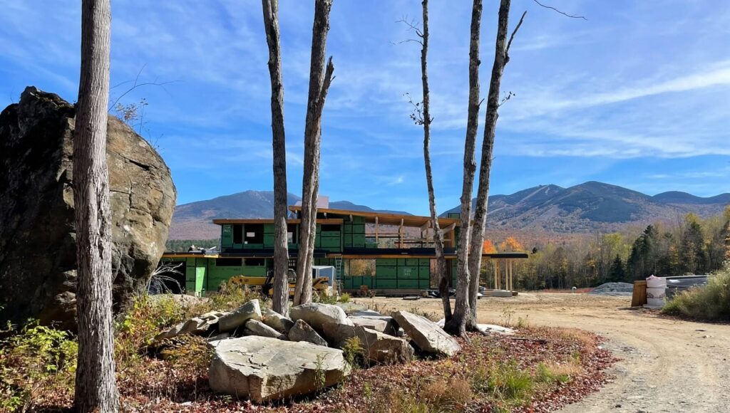 A modern home is assembled in the White Mountains